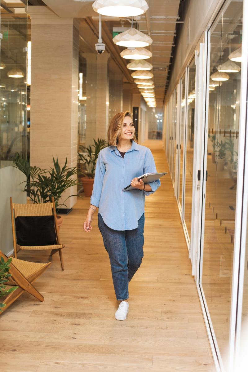 woman walking in office