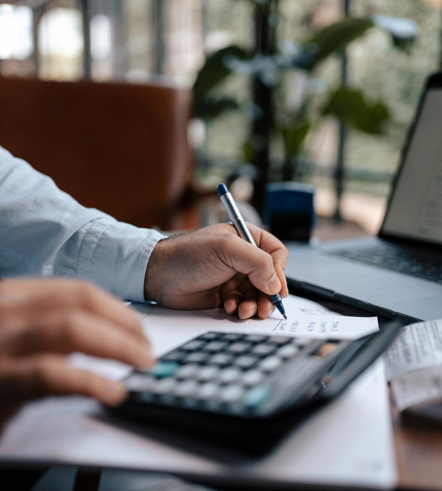 man using calculator